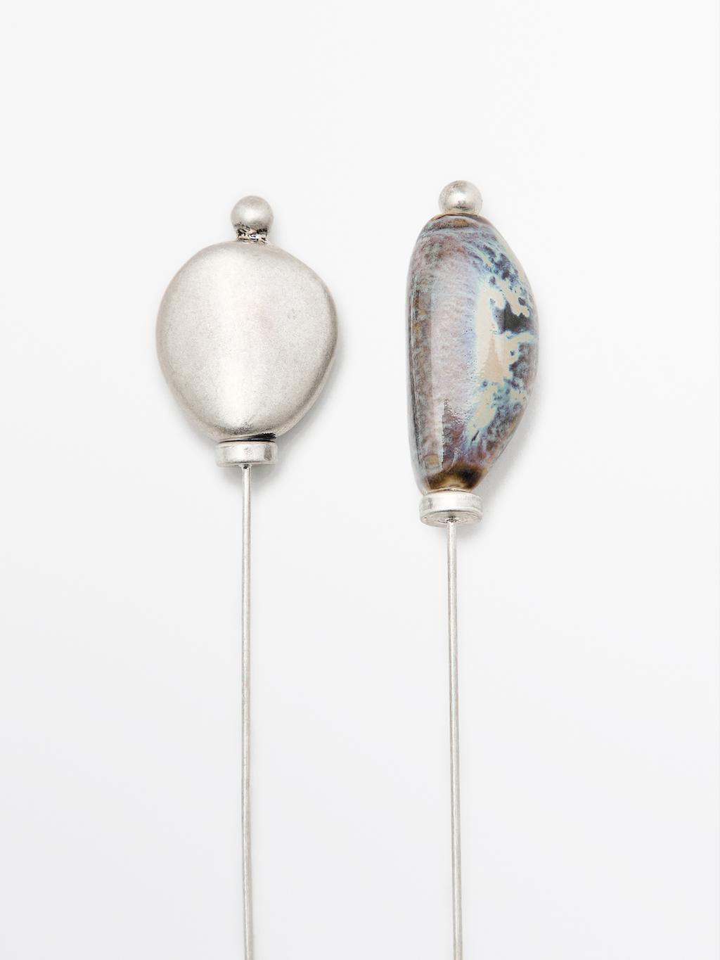 Brooch with ceramic leaf piece