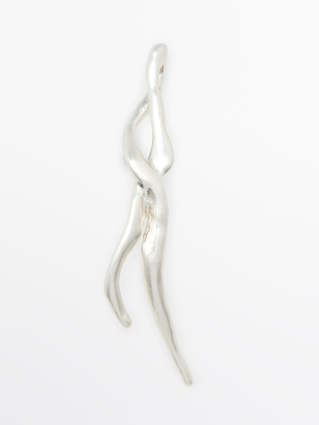 Abstract metal brooch