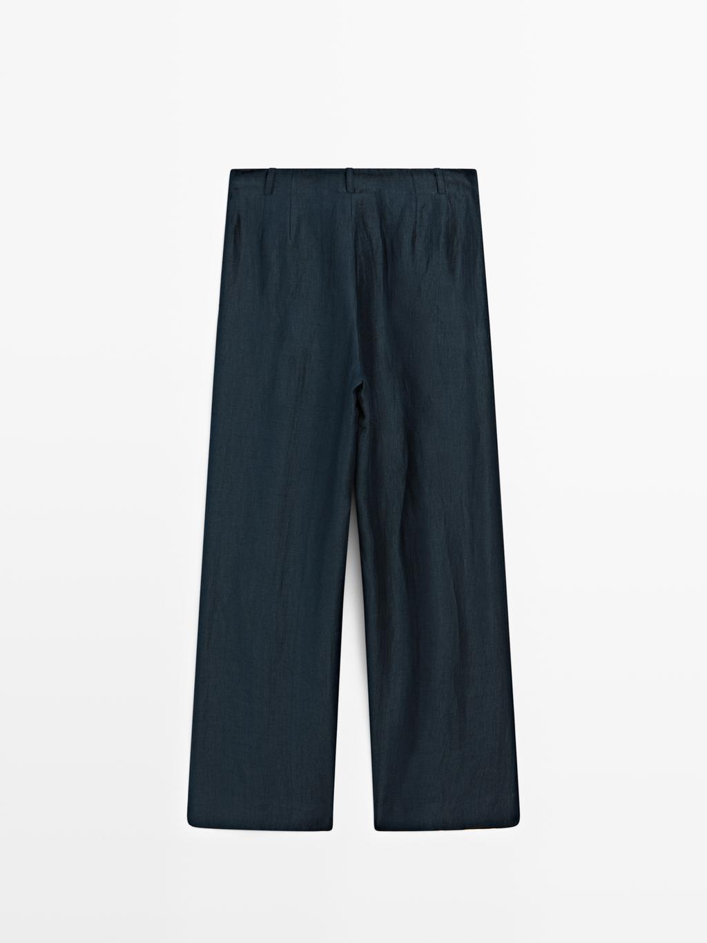 Loose-fitting linen blend trousers