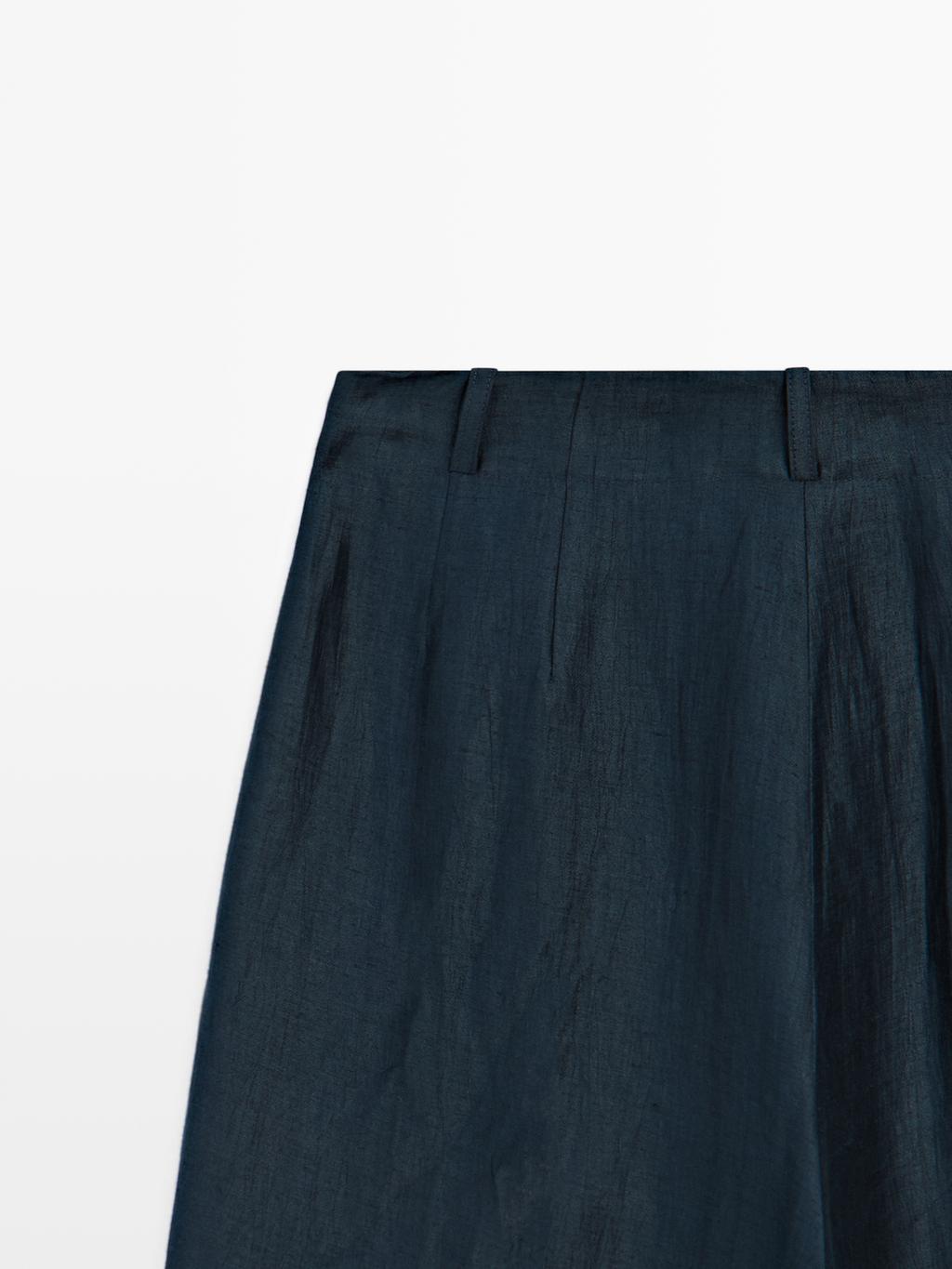 Loose-fitting linen blend trousers