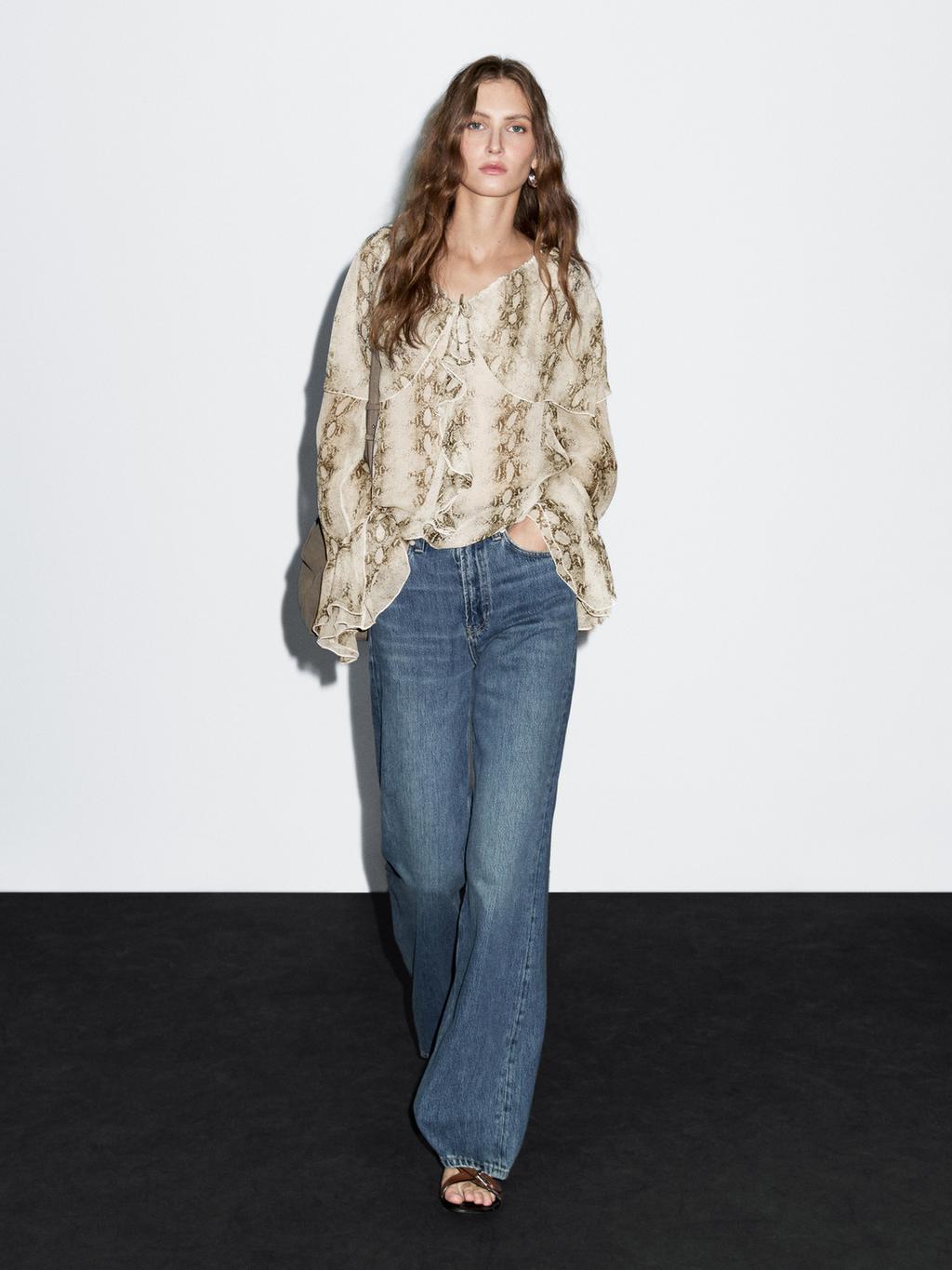 Snakeskin print blouse with ruffles