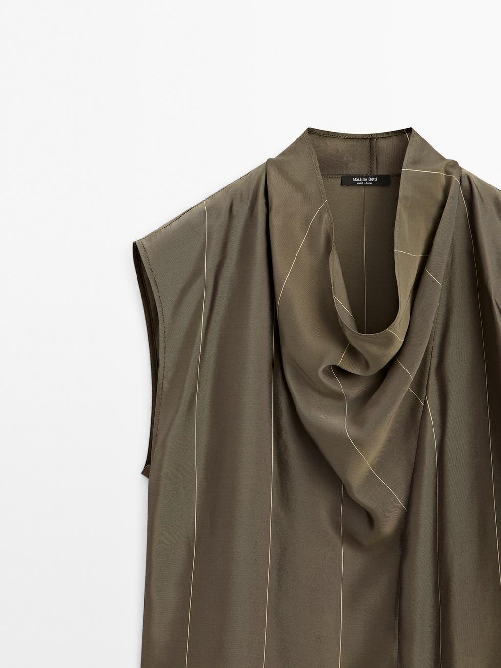 Flowing blouse with striped details