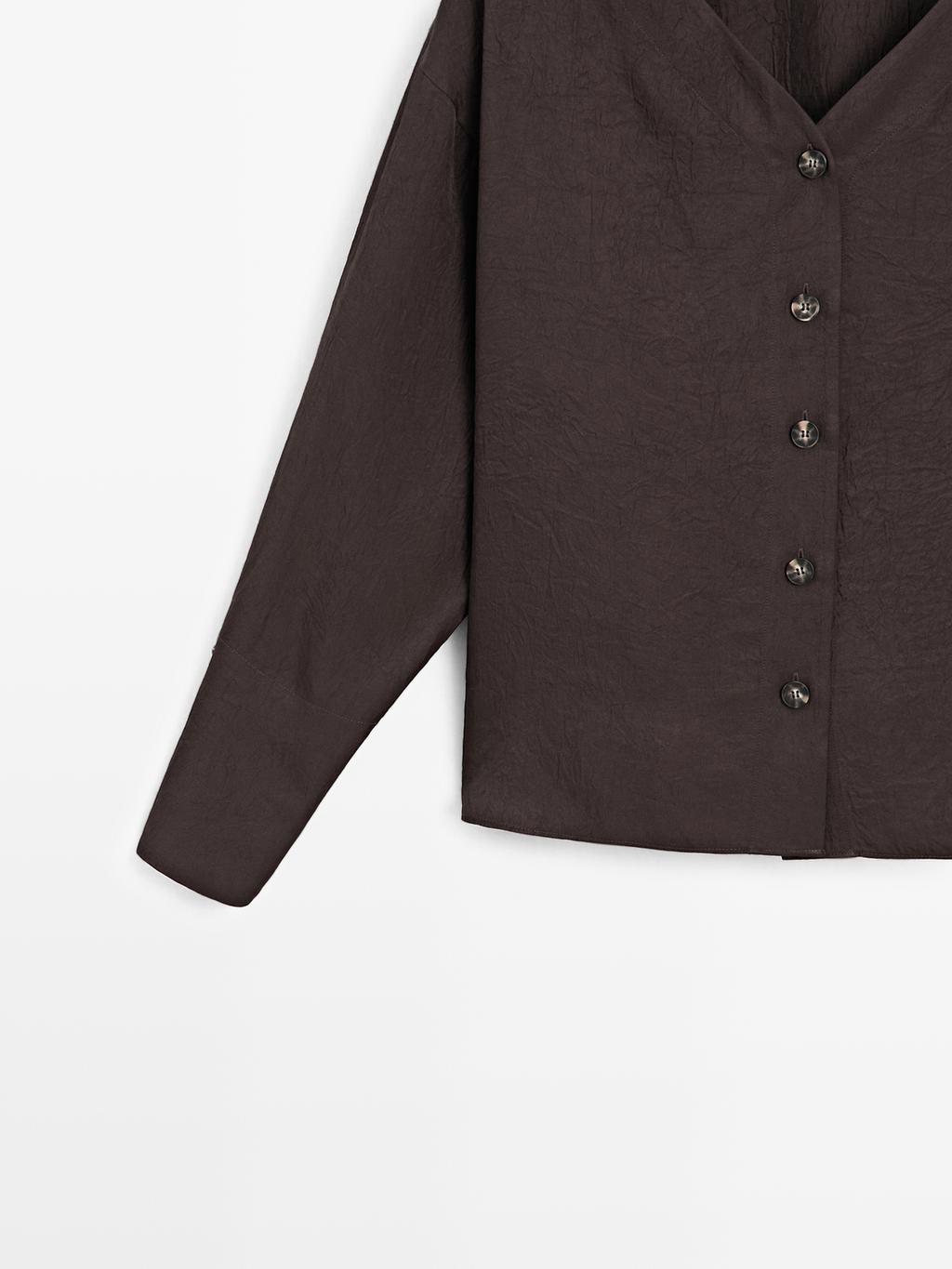 Flowing blouse with button details