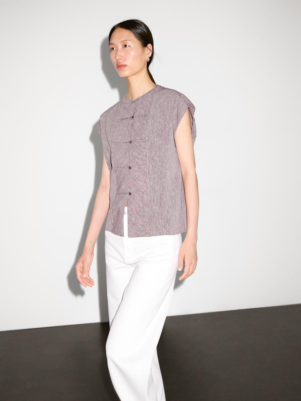 Flowing blouse with bib detail