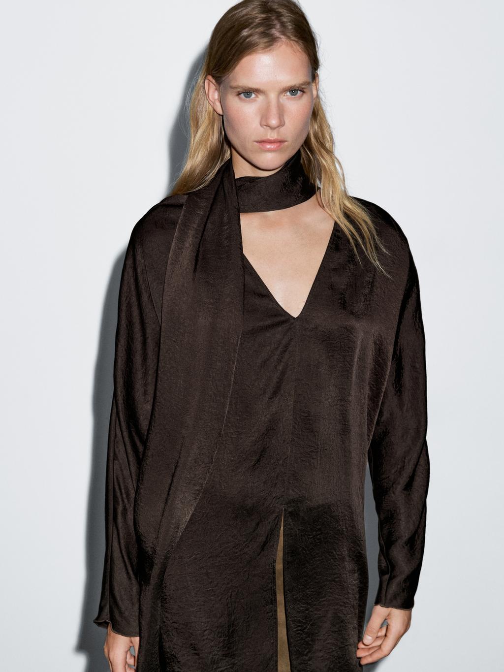 Long flowing blouse with tied neck