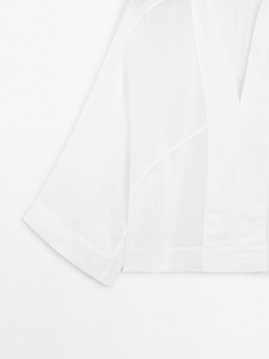 Flowing linen blend blouse with seam details