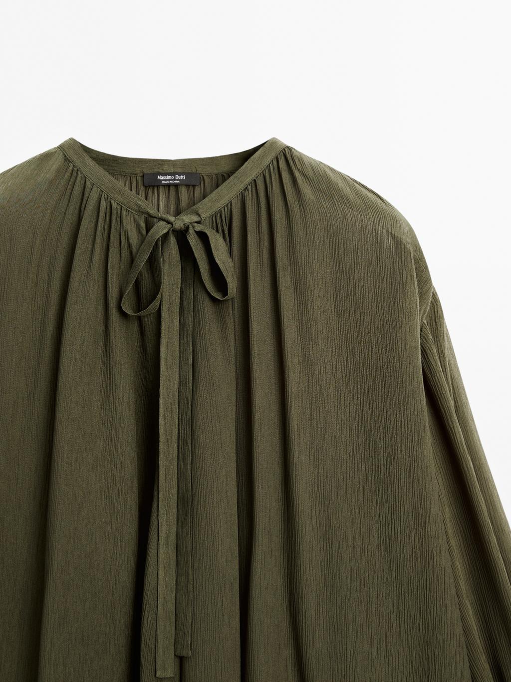 Cape blouse with ties