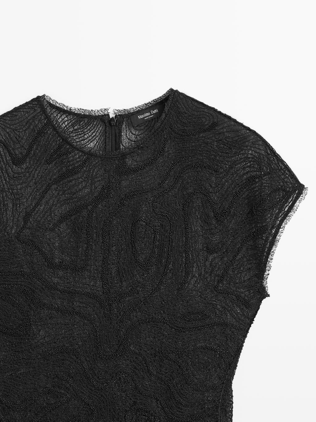 Semi-sheer embroidered top