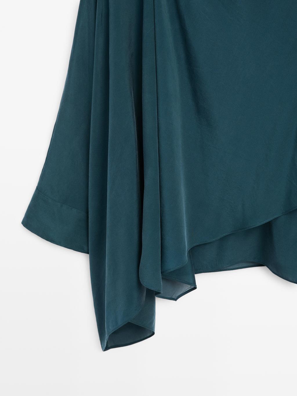 Flowing cape-style blouse