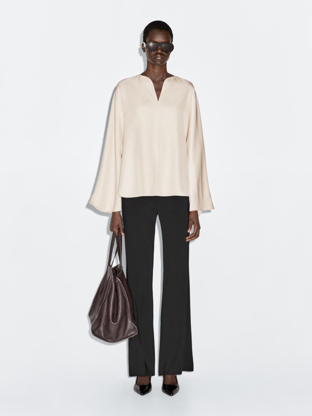 Flowing blouse with slit details