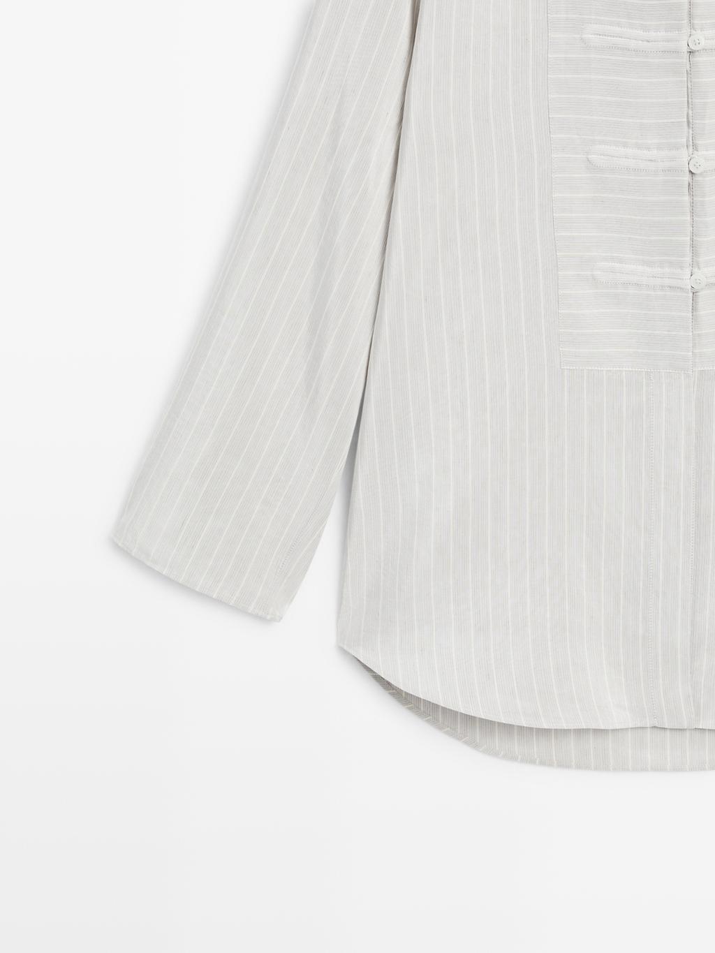 Striped oversize blouse with stand collar