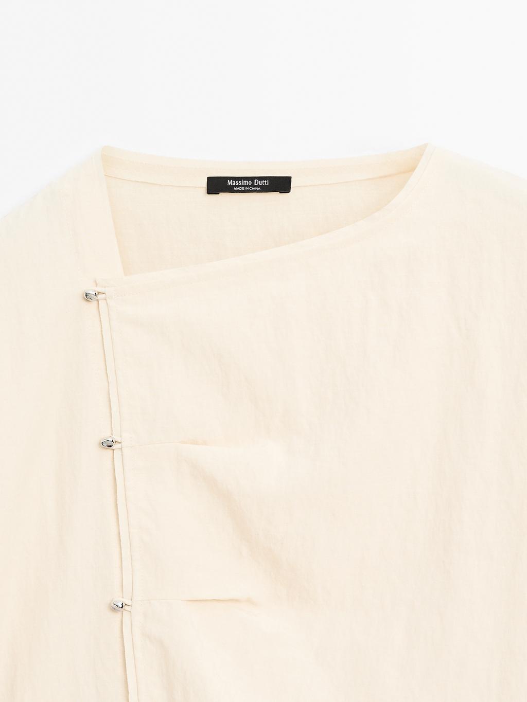 Long sleeve blouse with side button fastening