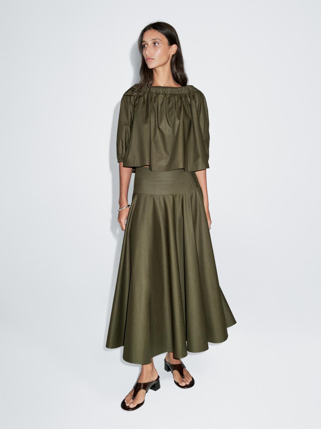 Flared midi skirt with sash belt