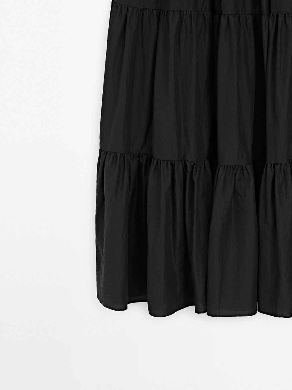 Long flared skirt with gathered detail