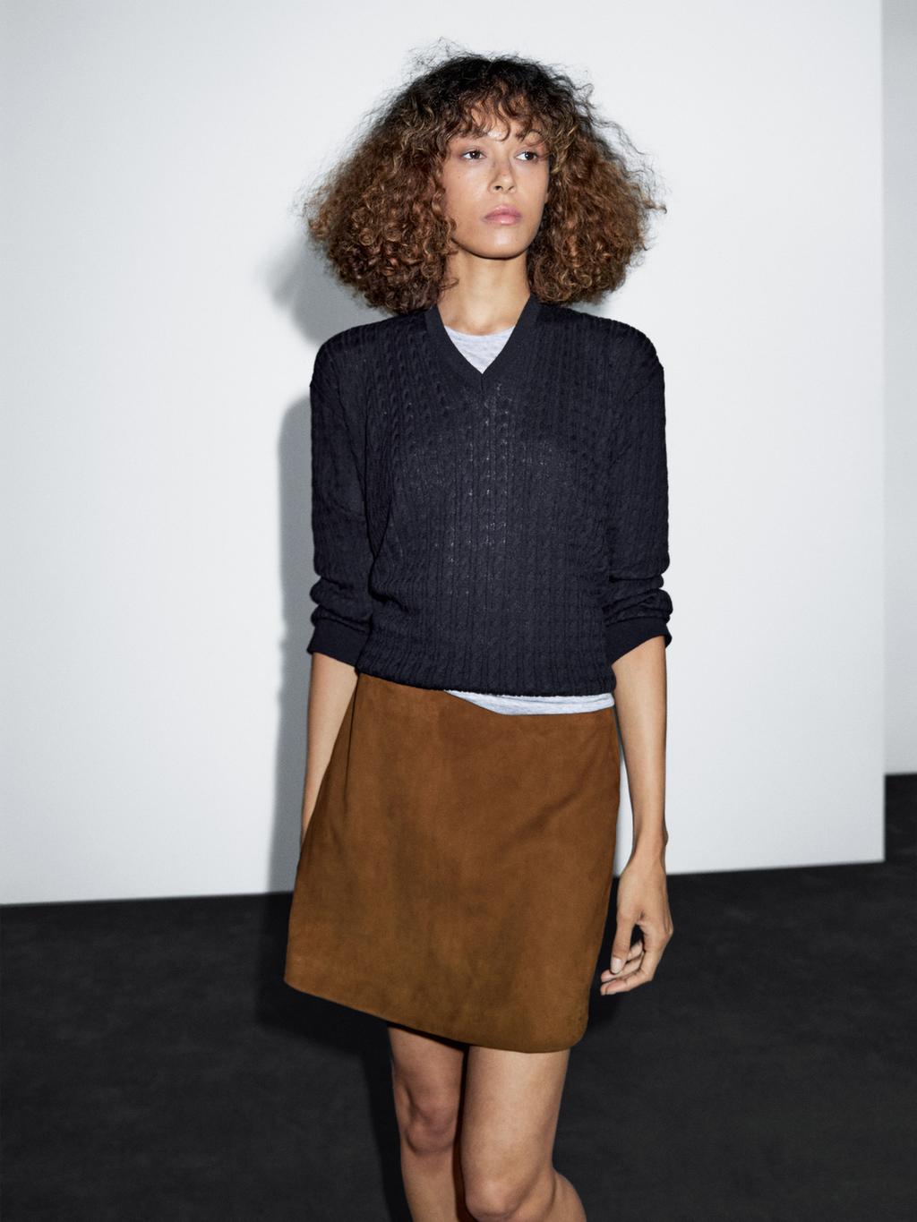 Suede leather mini skirt with topstitching