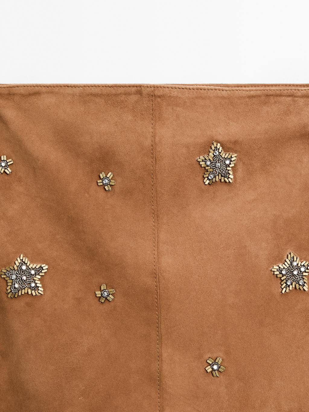 Suede leather skirt with rhinestone detail
