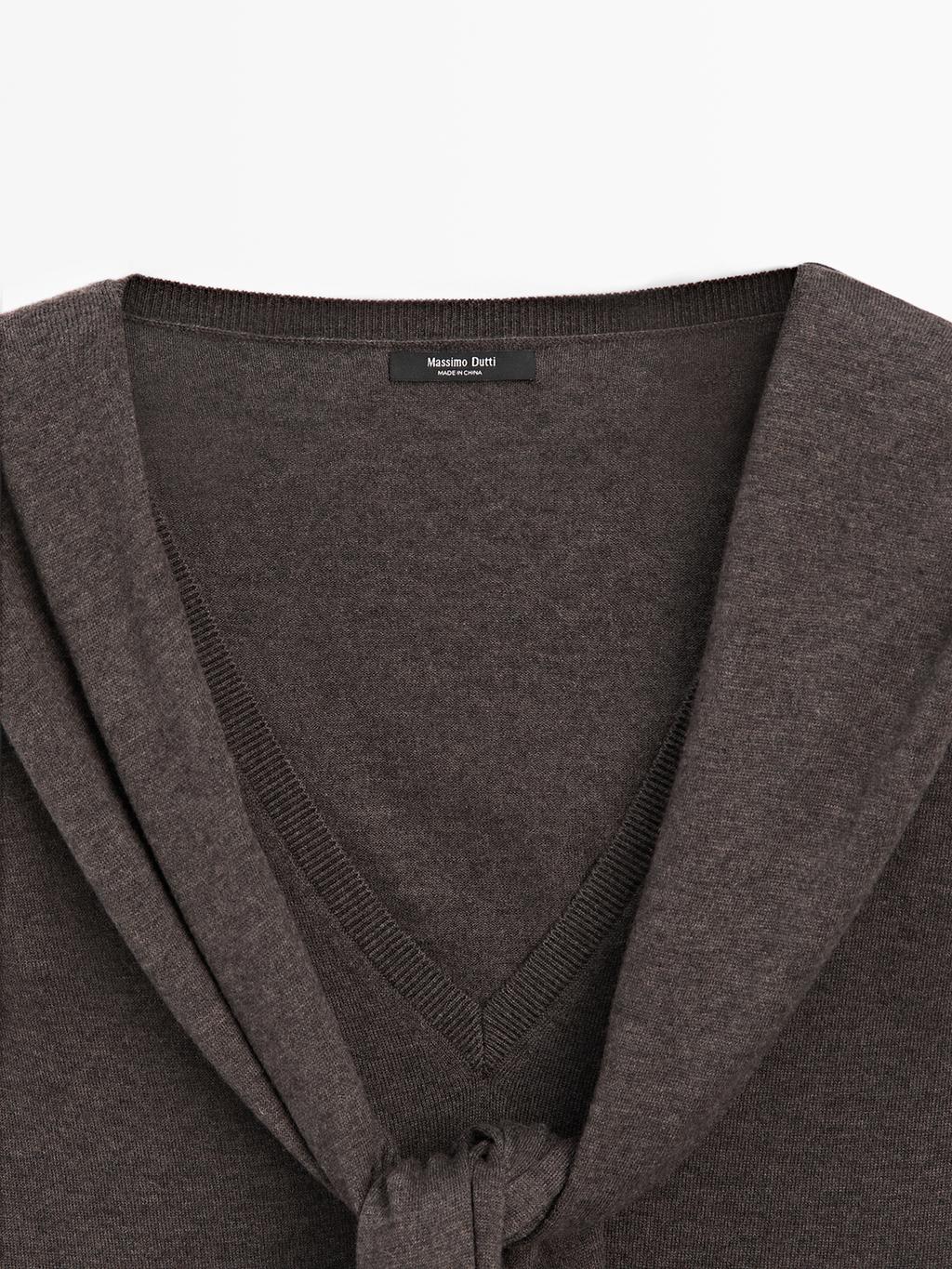 Knit sweater with multiway sleeves