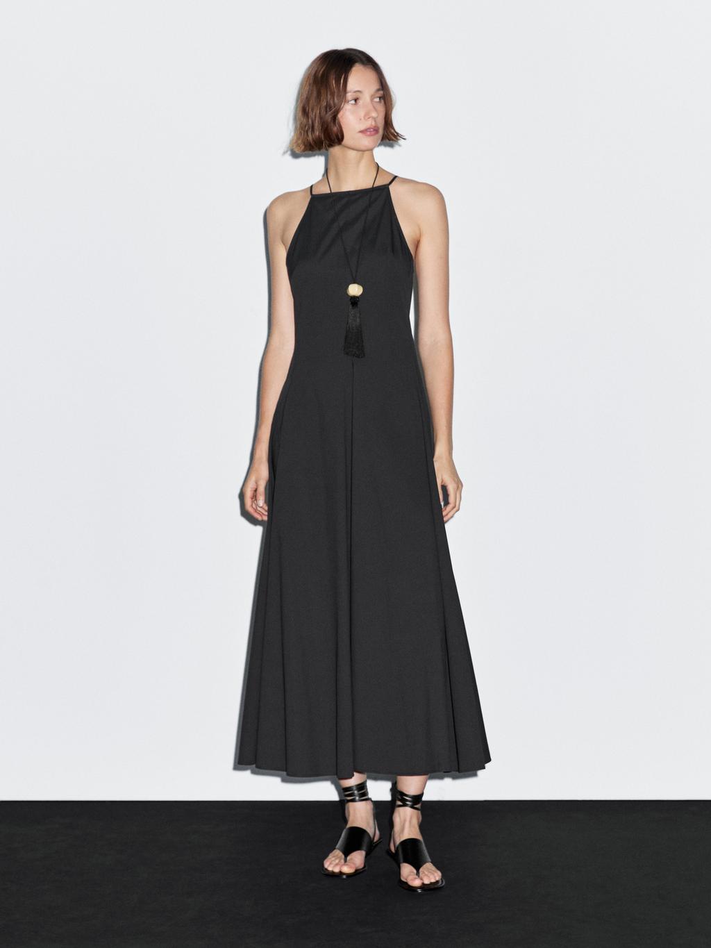 Long halter neck dress with flounce