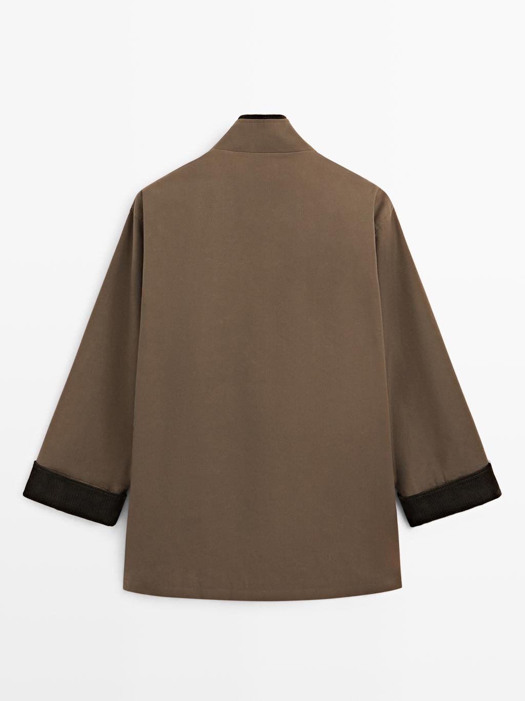 Waxed high neck parka with corduroy detail