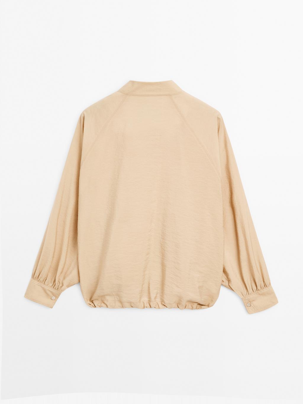 Loose-fitting bomber jacket with drawstring detail