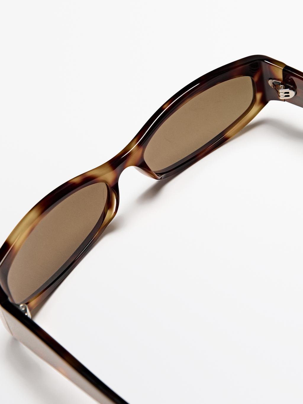 Small elongated sunglasses