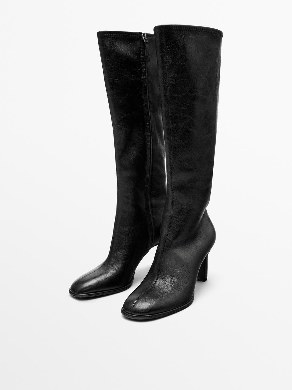 High-heel boots with elastic gores on the leg