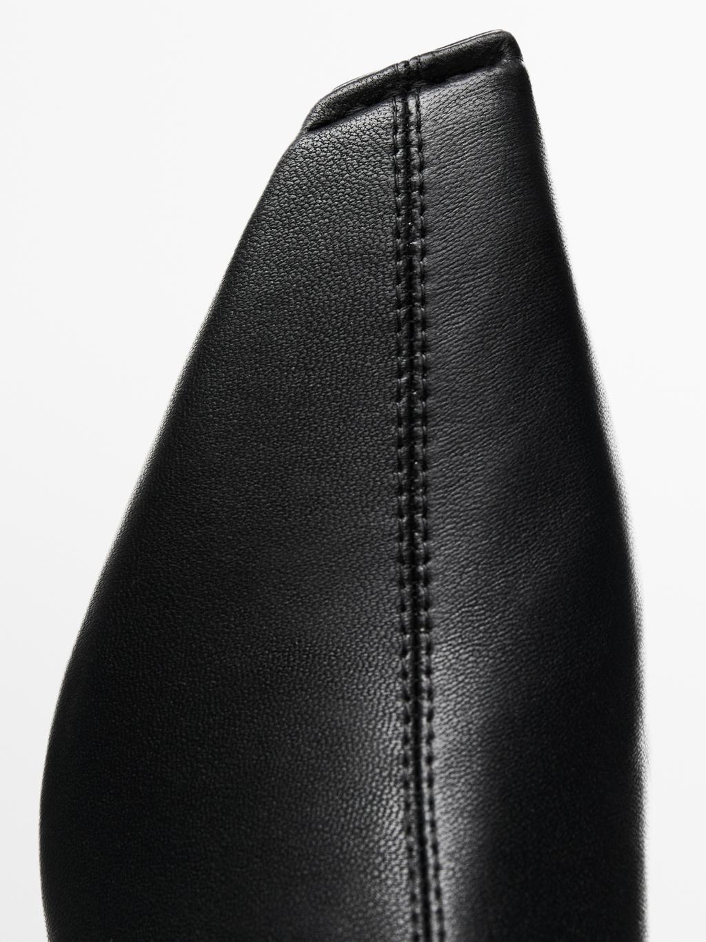 Stretch heeled boots - LIMITED