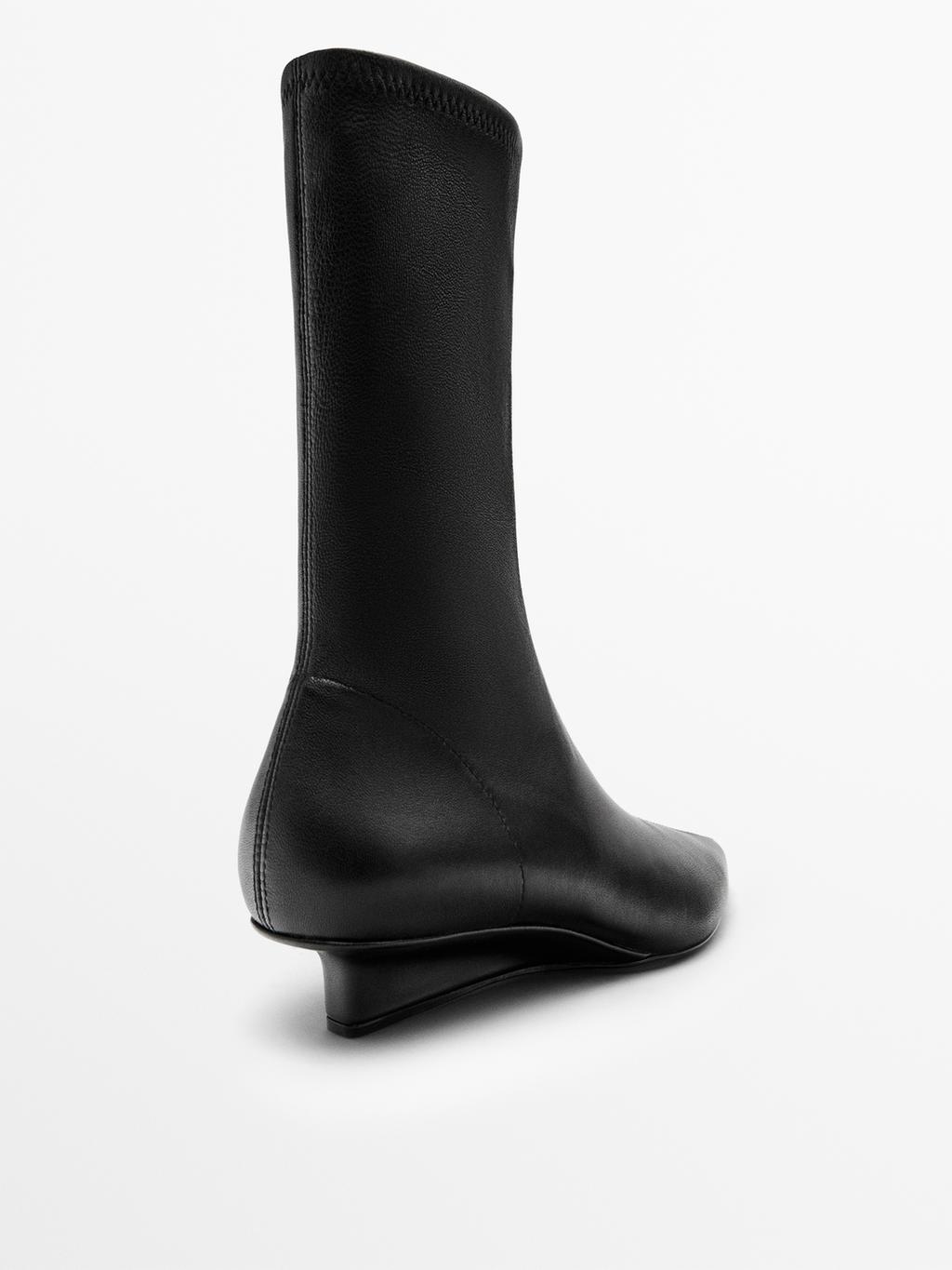 Stretch leather wedge ankle boots