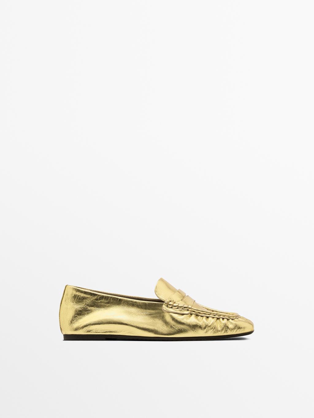 Gold penny loafers