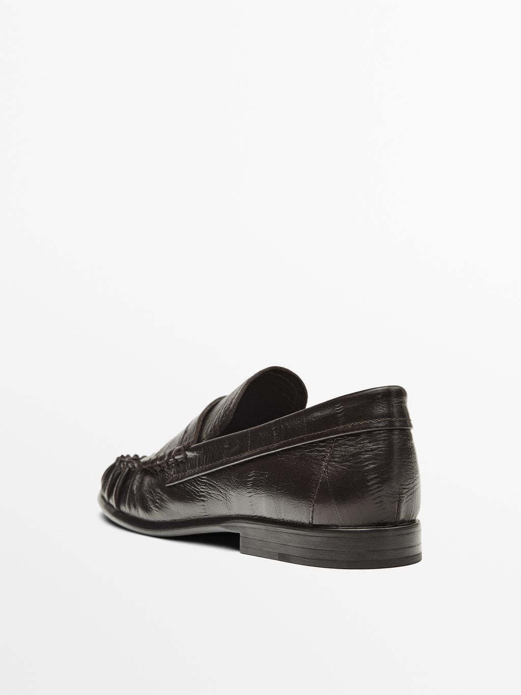 Embossed leather loafers